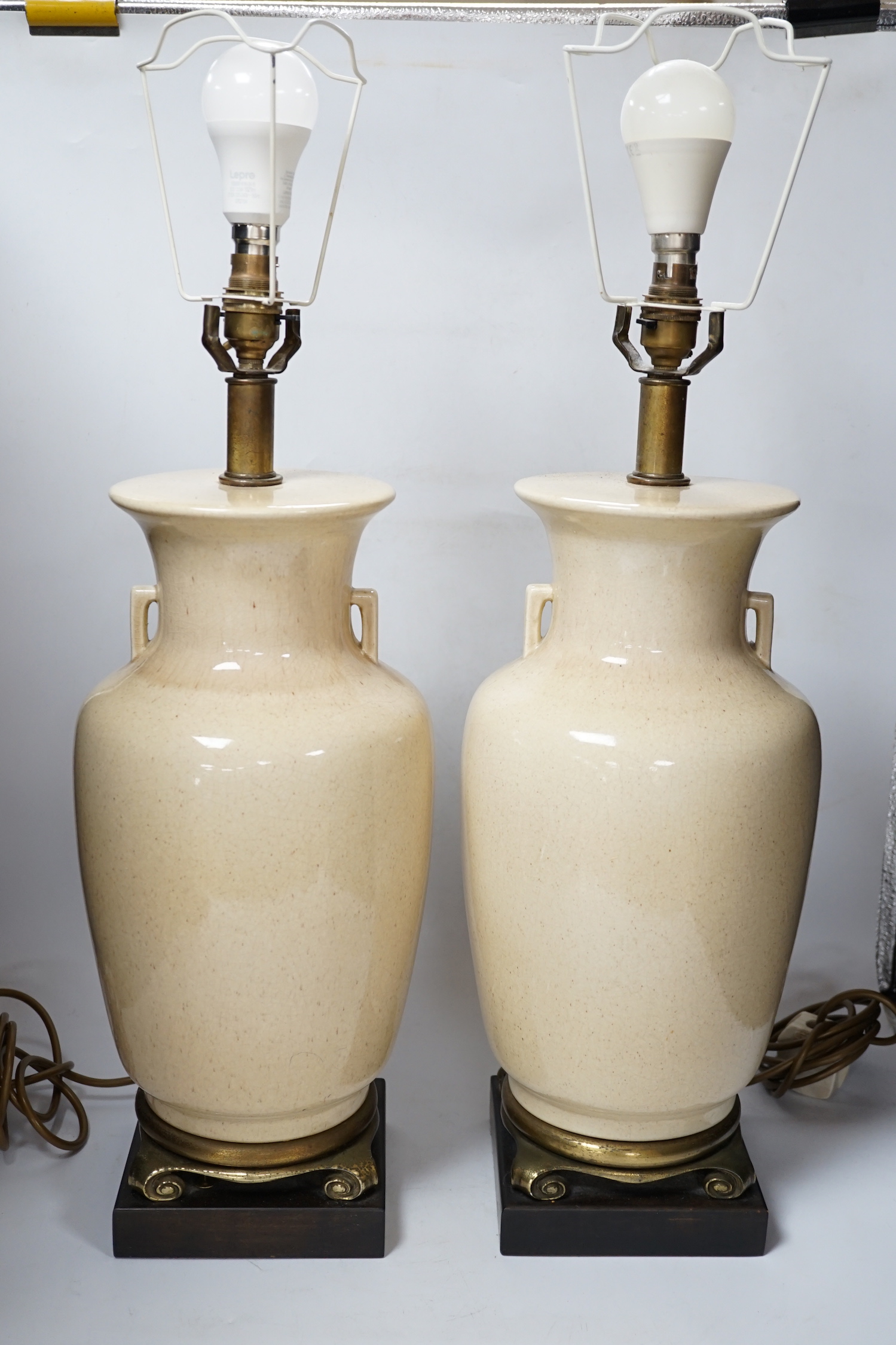 A pair of Chinese glazed table lamps, 43cm to ceramic top